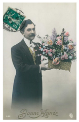 Handsome French Man with waxed mustache holding basket of roses and flowers