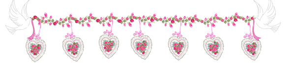 Beautiful Lace Hearts hang from a  Pink rose garland carried by white doves