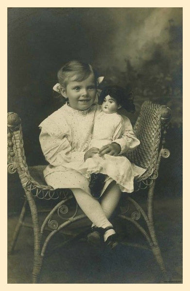 Antique Doll, Child & Rattan Bench
